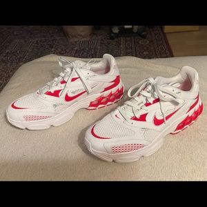 Red & white Nike Zoom Air.